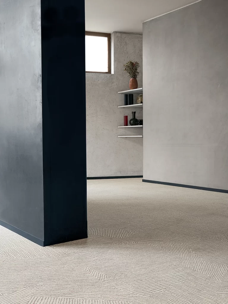Display zone with durable, low-maintenance carpet