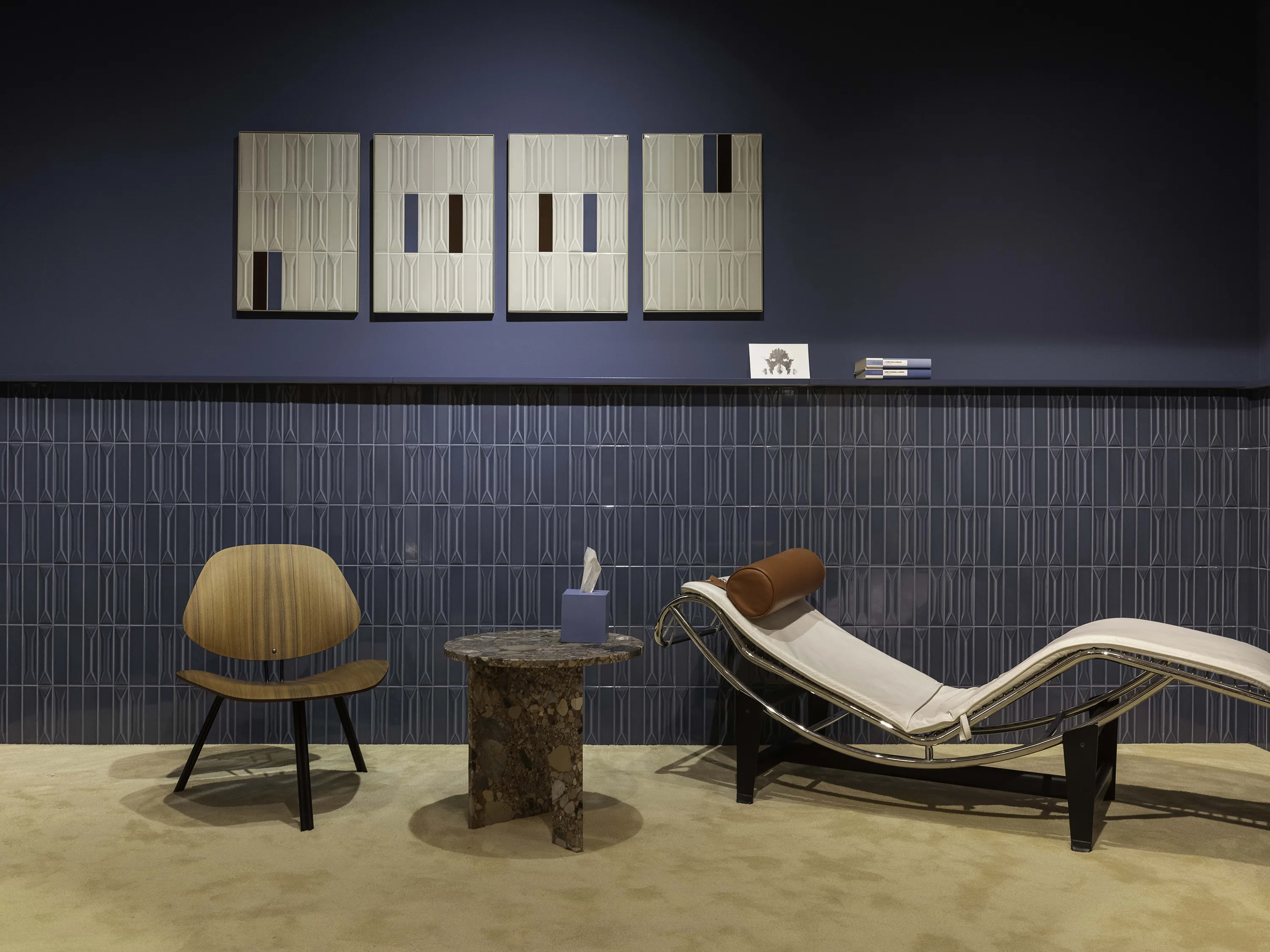 On the Sofa by Quintessenza Ceramiche, designed by Studio Salaris, featuring Dolcevita Vaniglia carpet by Radici Carpet.