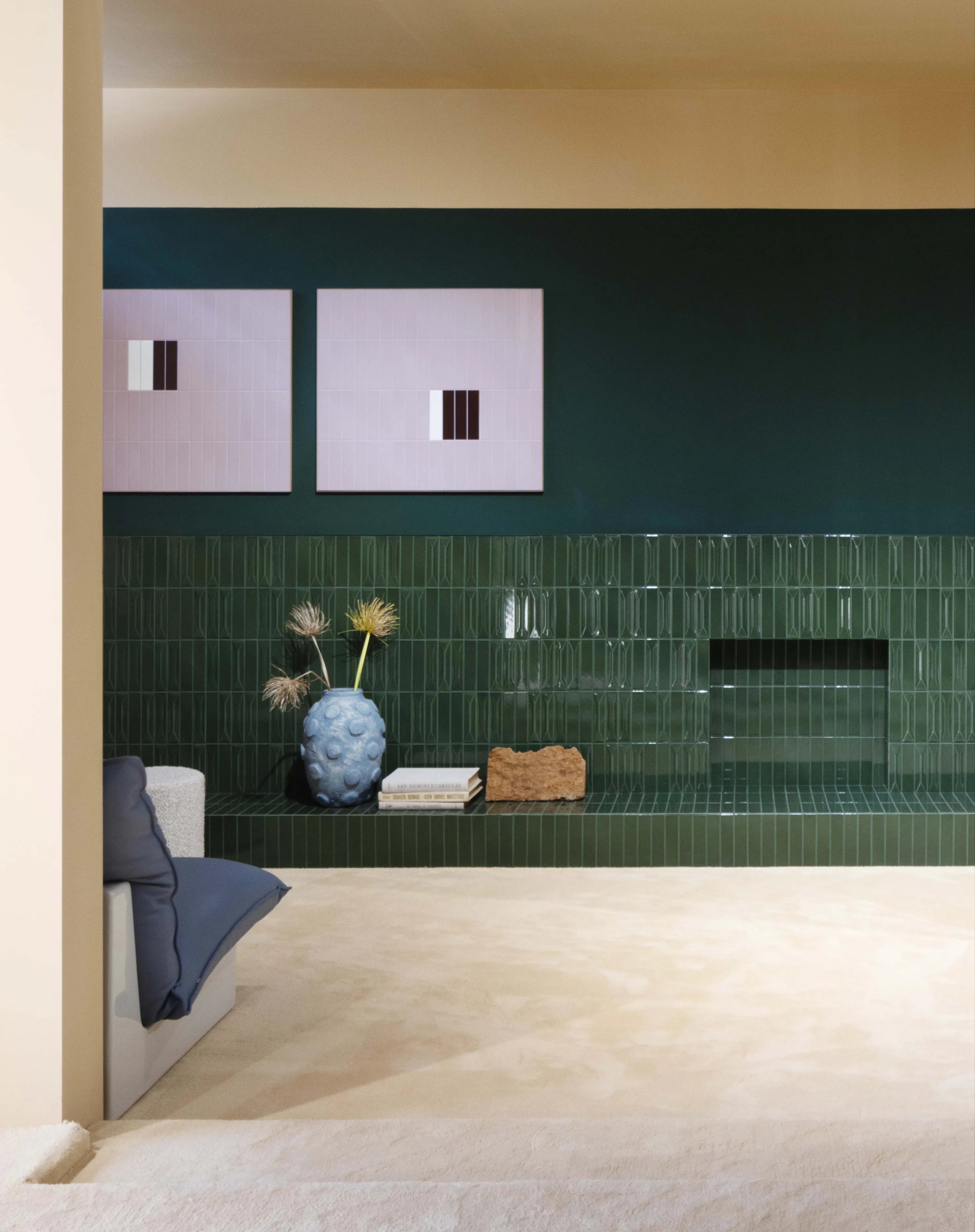 On the Sofa by Quintessenza Ceramiche, designed by Studio Salaris, featuring Dolcevita Vaniglia carpet by Radici Carpet.