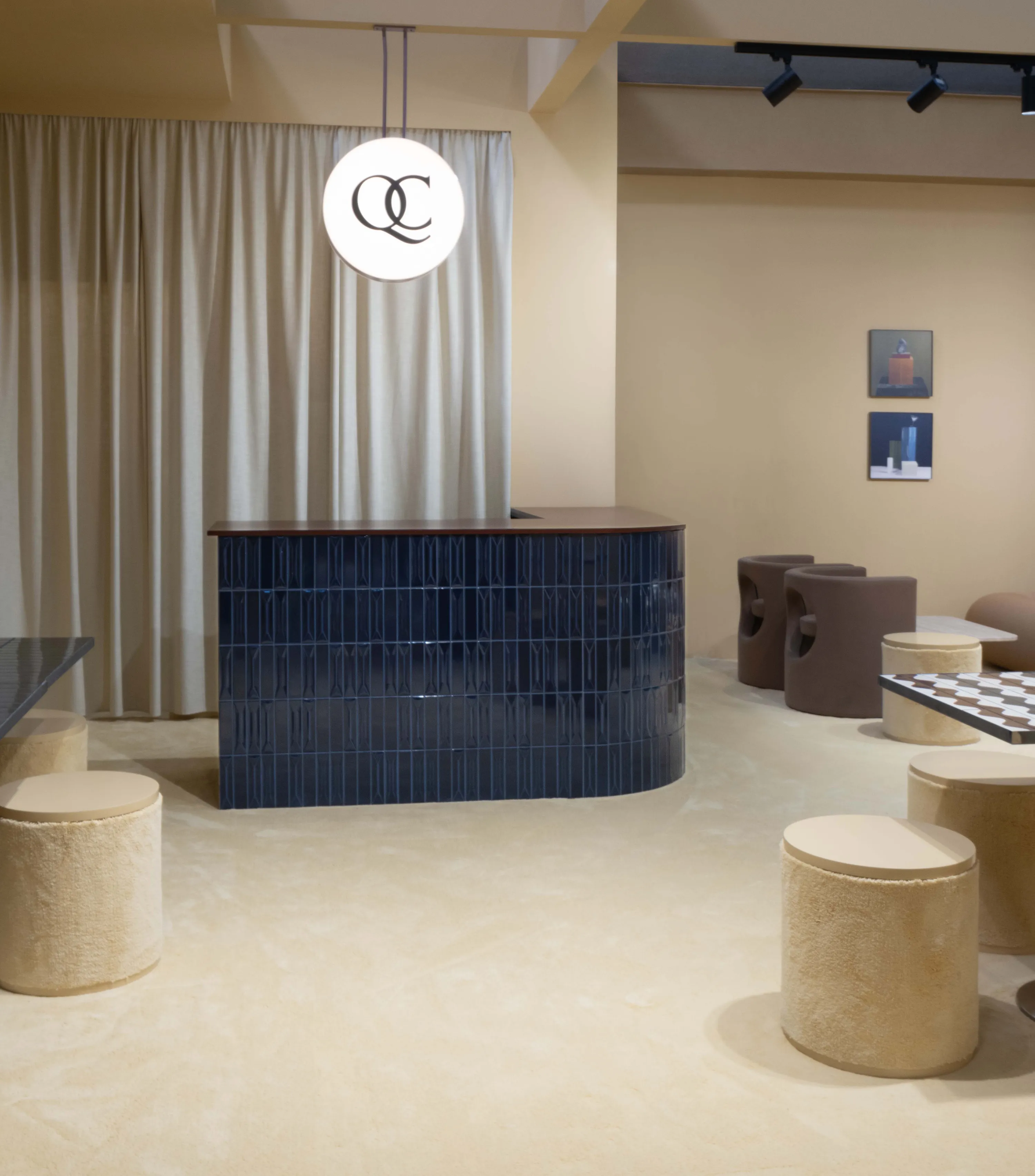 On the Sofa by Quintessenza Ceramiche, designed by Studio Salaris, featuring Dolcevita Vaniglia carpet by Radici Carpet.